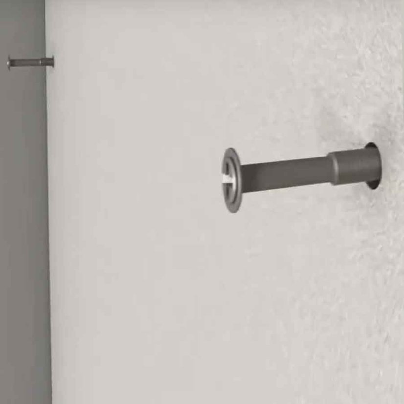 Uchytenie panelu dvomi skrutkami v hornej časti o stenu