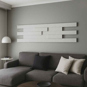 Akustické tehličky lepené na stene